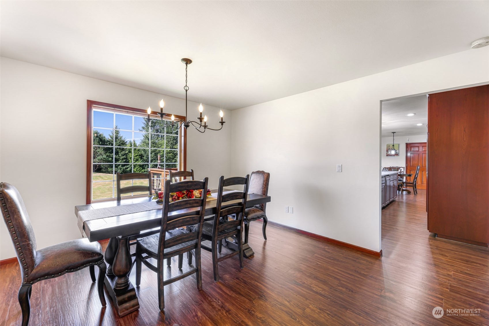 2756 Brown Road Ferndale, WA 98248 - Photo 17 of 35 a view of a dining room with furniture window and wooden floor
