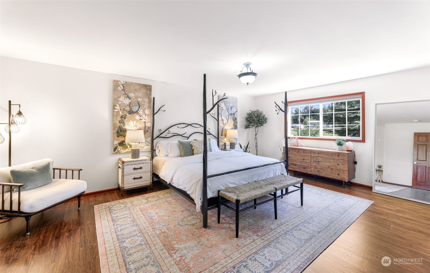 2756 Brown Road Ferndale, WA 98248 - Photo 21 of 35 a bedroom with furniture and wooden floor