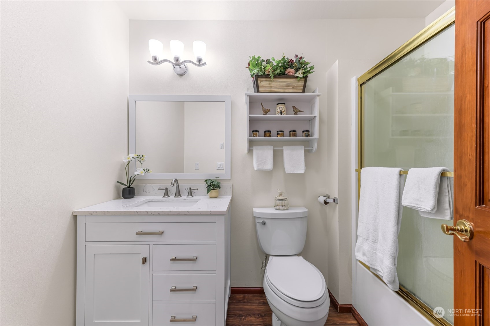 2756 Brown Road Ferndale, WA 98248 - Photo 26 of 35 a bathroom with a toilet a sink and a mirror