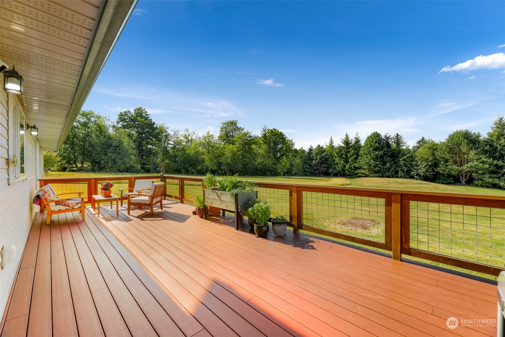 2756 Brown Road Ferndale, WA 98248 - Photo 28 of 35 a view of deck with chairs and wooden floor