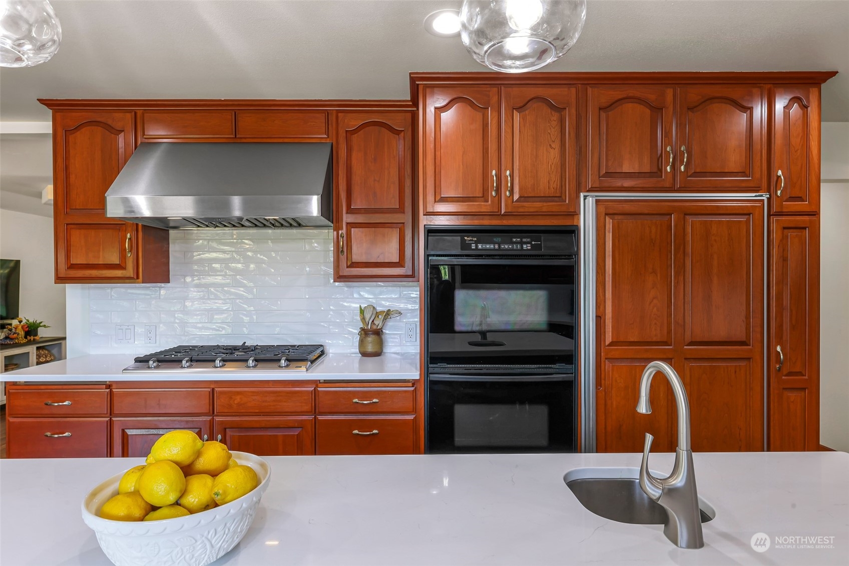 2756 Brown Road Ferndale, WA 98248 - Photo 8 of 35 a kitchen with stainless steel appliances granite countertop a stove a sink and a microwave