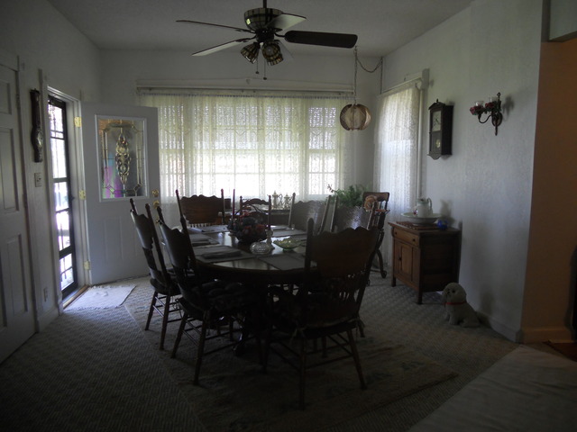 18442 East Twombly Road Rochelle, IL 61068 - Photo 6 of 20 a view of a dining room with furniture and window