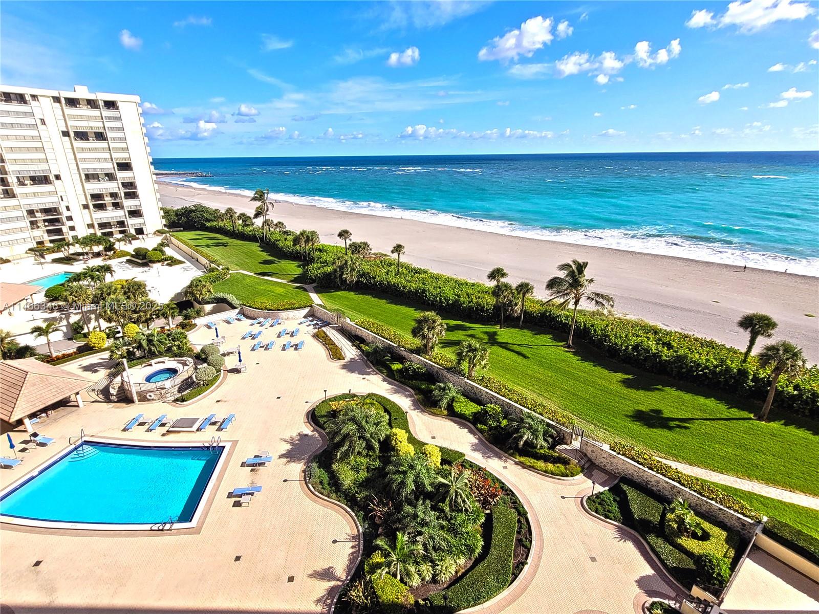 300 Ocean Trail Way, Unit 903 Jupiter, FL 33477 - Photo 2 of 19 a view of an ocean and beach