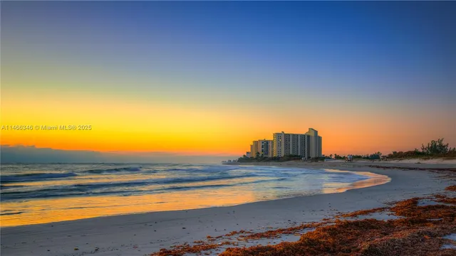 a view of a lake with a big yard
