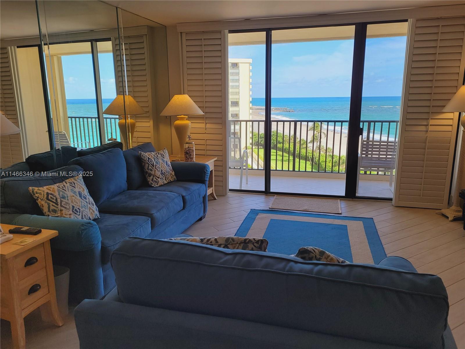 300 Ocean Trail Way, Unit 903 Jupiter, FL 33477 - Photo 7 of 19 a living room with furniture and a window