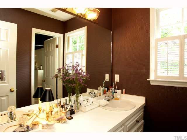 2825 Van Dyke Avenue Raleigh, NC 27607 - Photo 11 of 12 Also, upstairs is a very large hall bathroom AND separate dressing area with dual sinks and plenty of cabinet storage. Tile floors are in the shower/toilet area