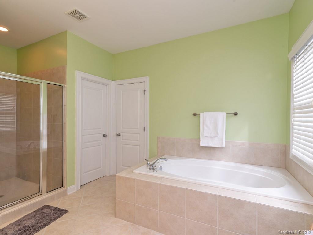 1148 Market Street Fort Mill, SC 29708 - Photo 20 of 25 a spacious bathroom with a bathtub and shower