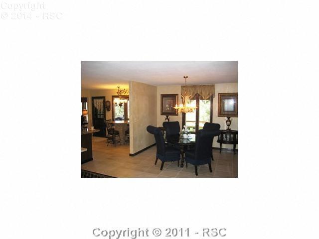 5425 Madera Road Colorado Springs, CO 80918 - Photo 7 of 11 Nice dining room that will accomodate your large dining room furniture. Tile floor.