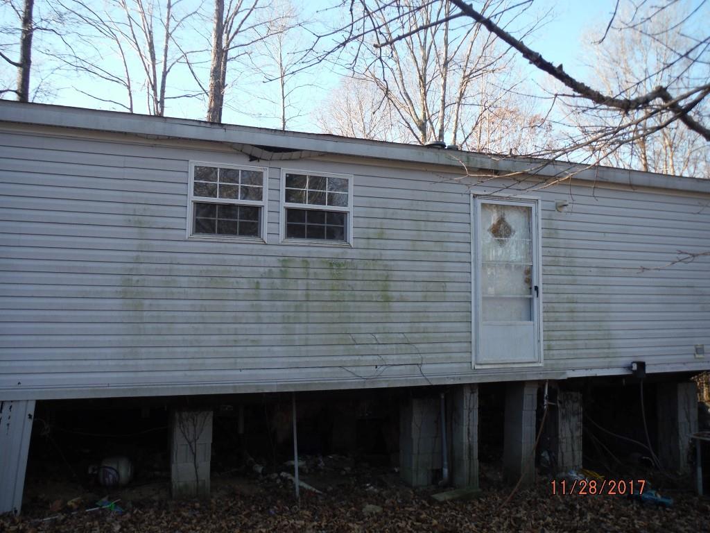 599 Lucas Road Dickson, TN 37055 - Photo 3 of 12 a view of a house with a yard