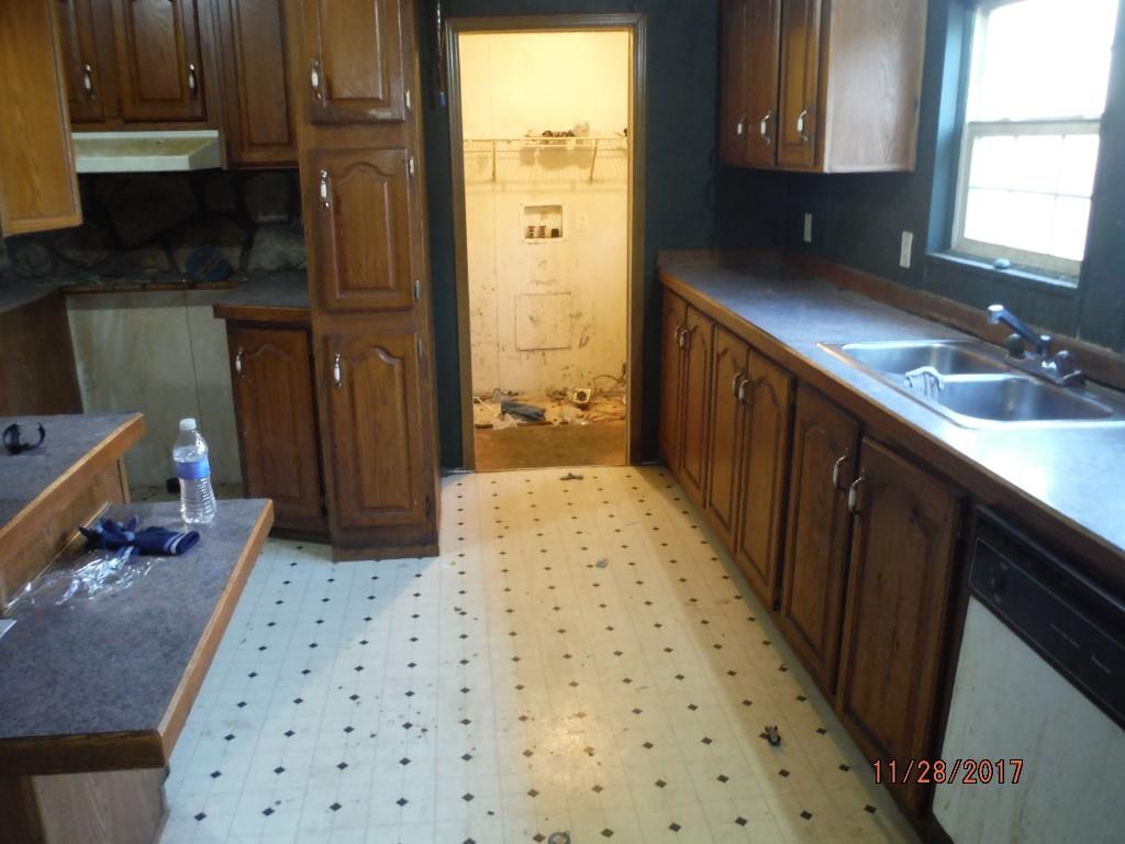 599 Lucas Road Dickson, TN 37055 - Photo 6 of 12 a bathroom with a sink shower and a mirror