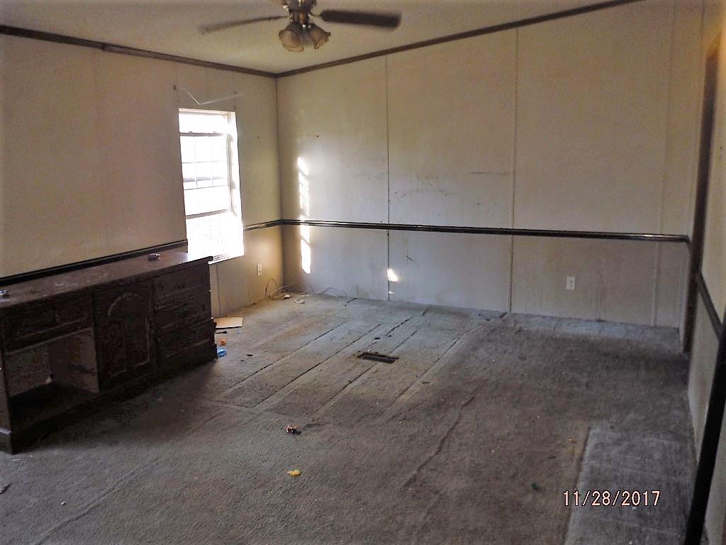 599 Lucas Road Dickson, TN 37055 - Photo 8 of 12 a view of a closet area with wooden floor