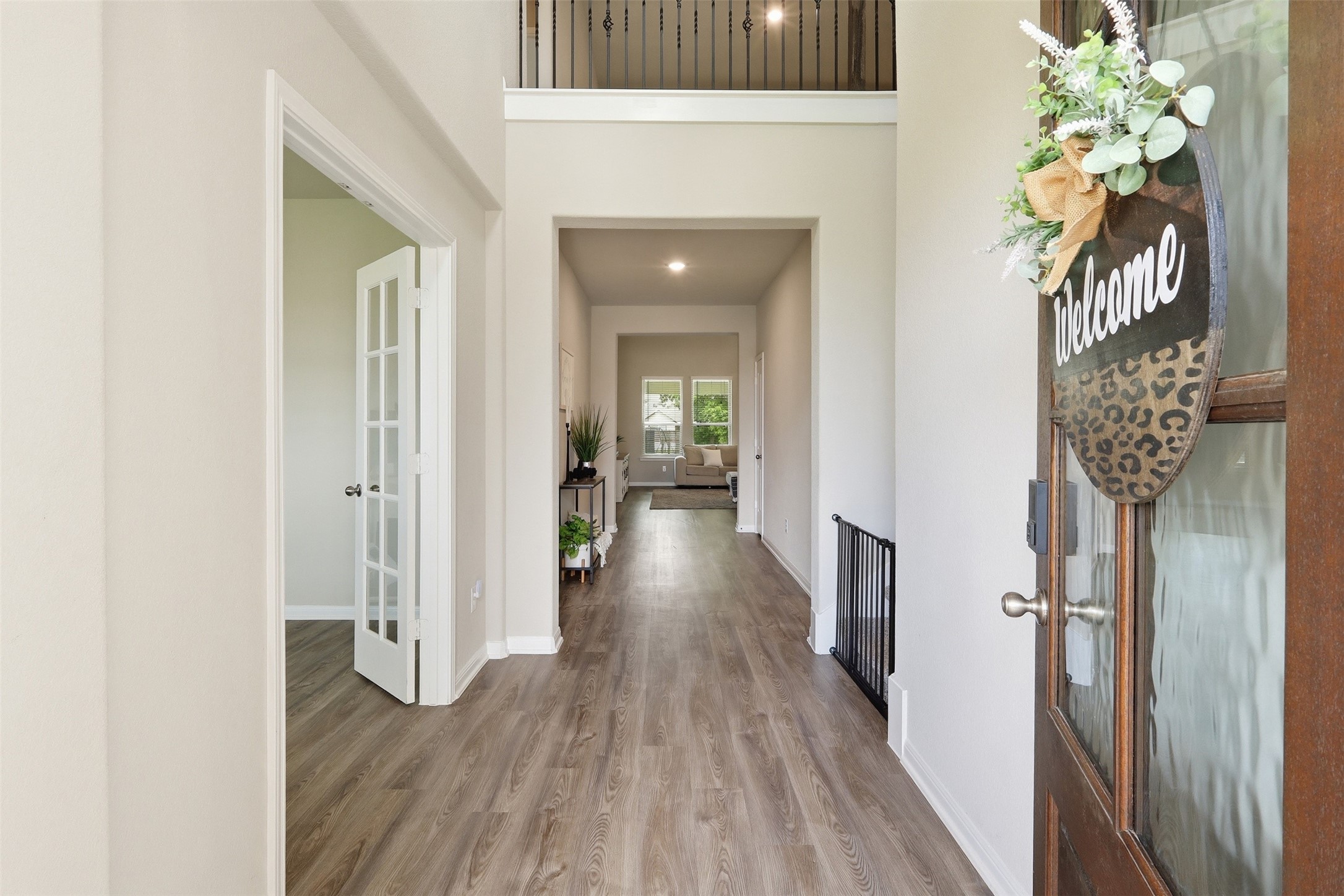 6310 Fawn Path Drive Conroe, TX 77303 - Photo 5 of 41 Grand first impression! Bright, welcoming entry with soaring ceilings and an open, inviting foyer.