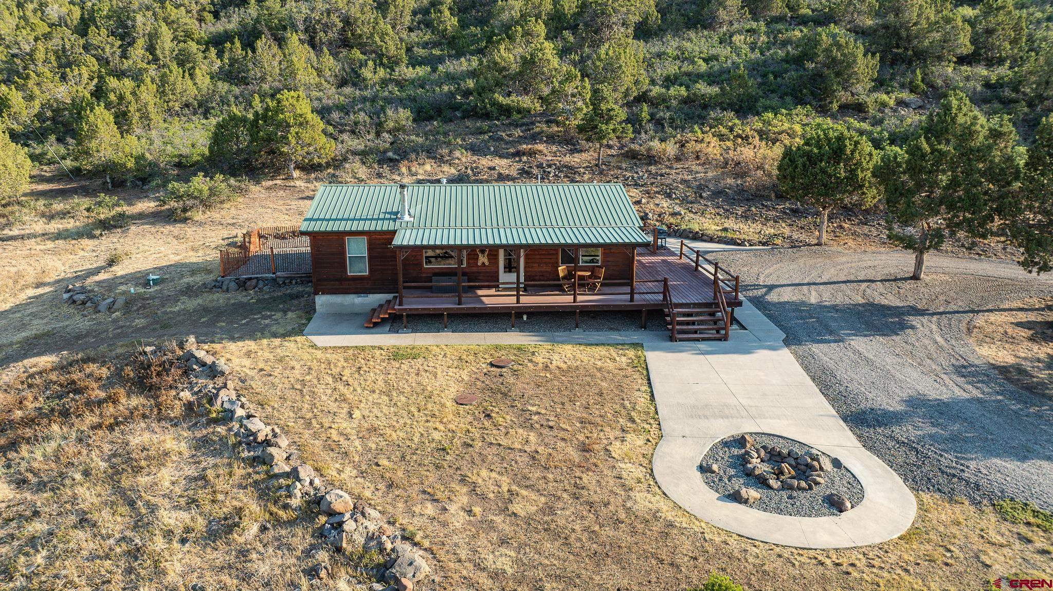 21578 Highway 65 Cedaredge, CO 81413 - Photo 15 of 45 swimming pool view with a sitting space