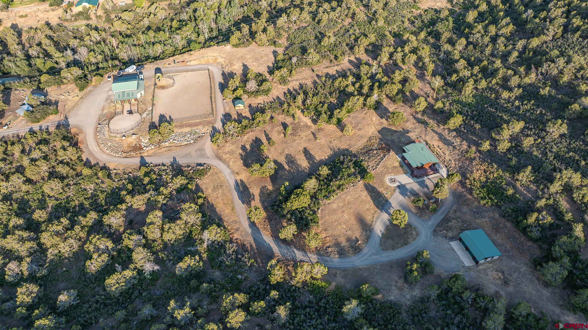 21578 Highway 65 Cedaredge, CO 81413 - Photo 18 of 45 an aerial view of a house with a yard