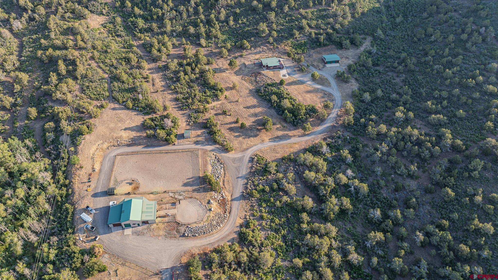 21578 Highway 65 Cedaredge, CO 81413 - Photo 19 of 45 an aerial view of a house with outdoor space