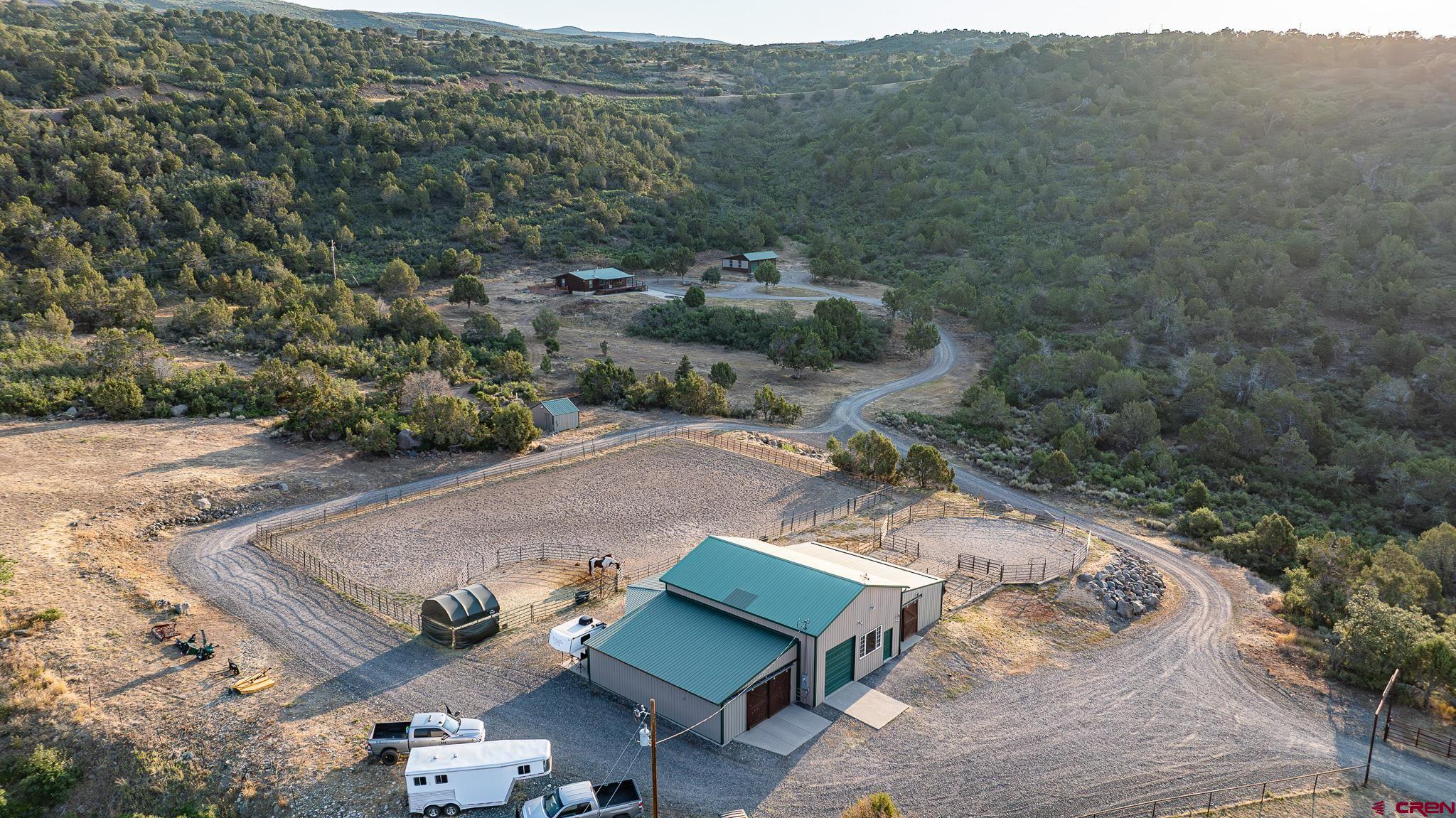 21578 Highway 65 Cedaredge, CO 81413 - Photo 23 of 45 an aerial view of a house with a yard