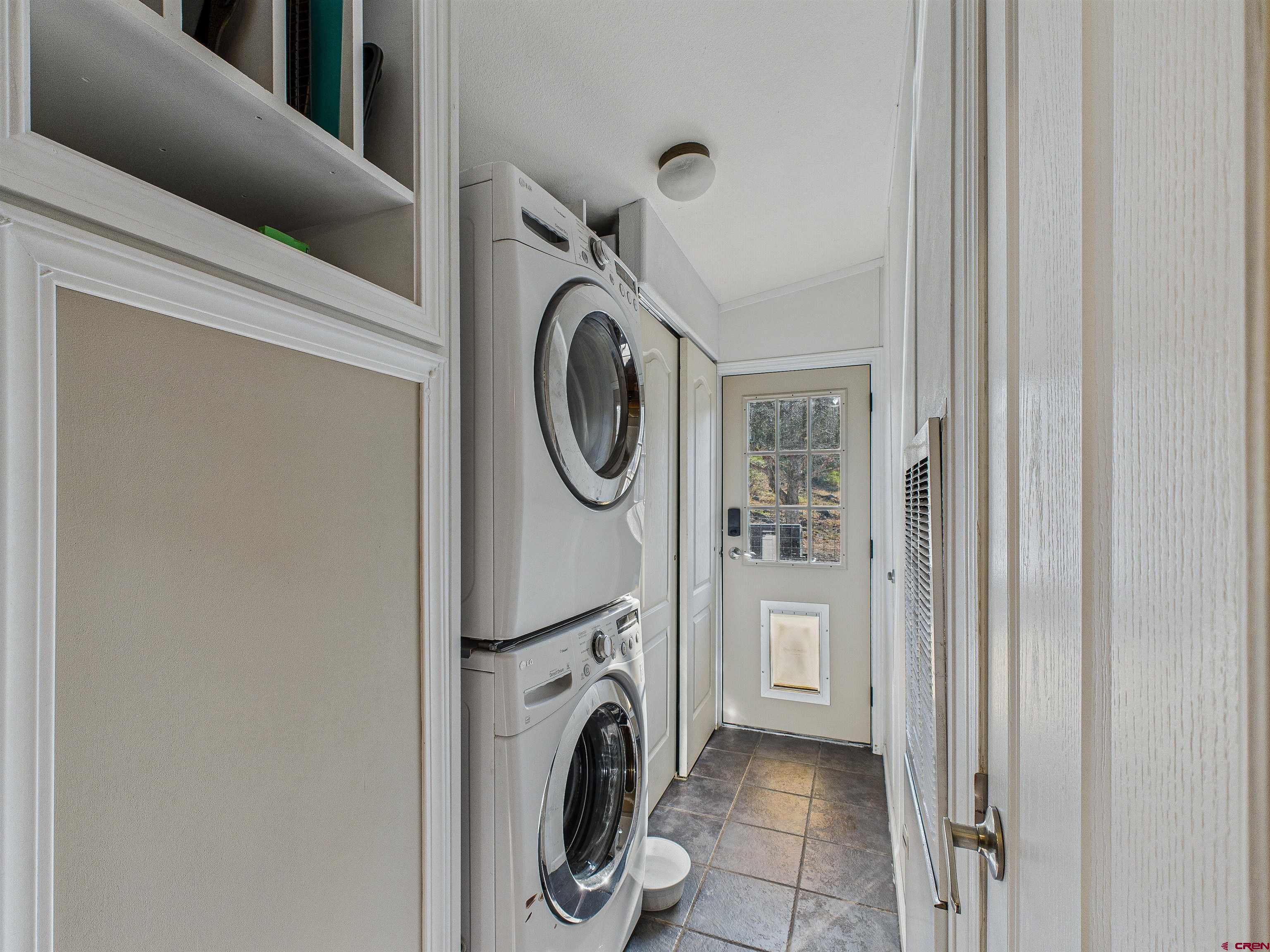 21578 Highway 65 Cedaredge, CO 81413 - Photo 29 of 45 a view of livingroom with washer and dryer
