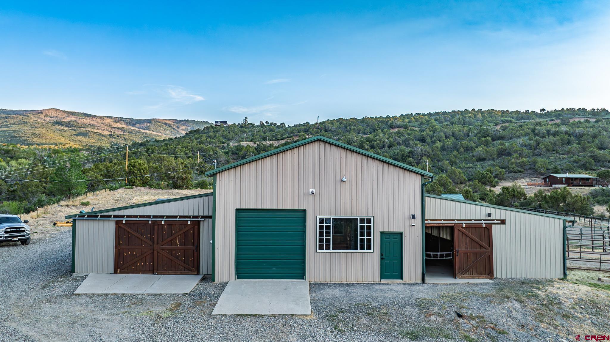 21578 Highway 65 Cedaredge, CO 81413 - Photo 5 of 45 a view of a house with a outdoor space