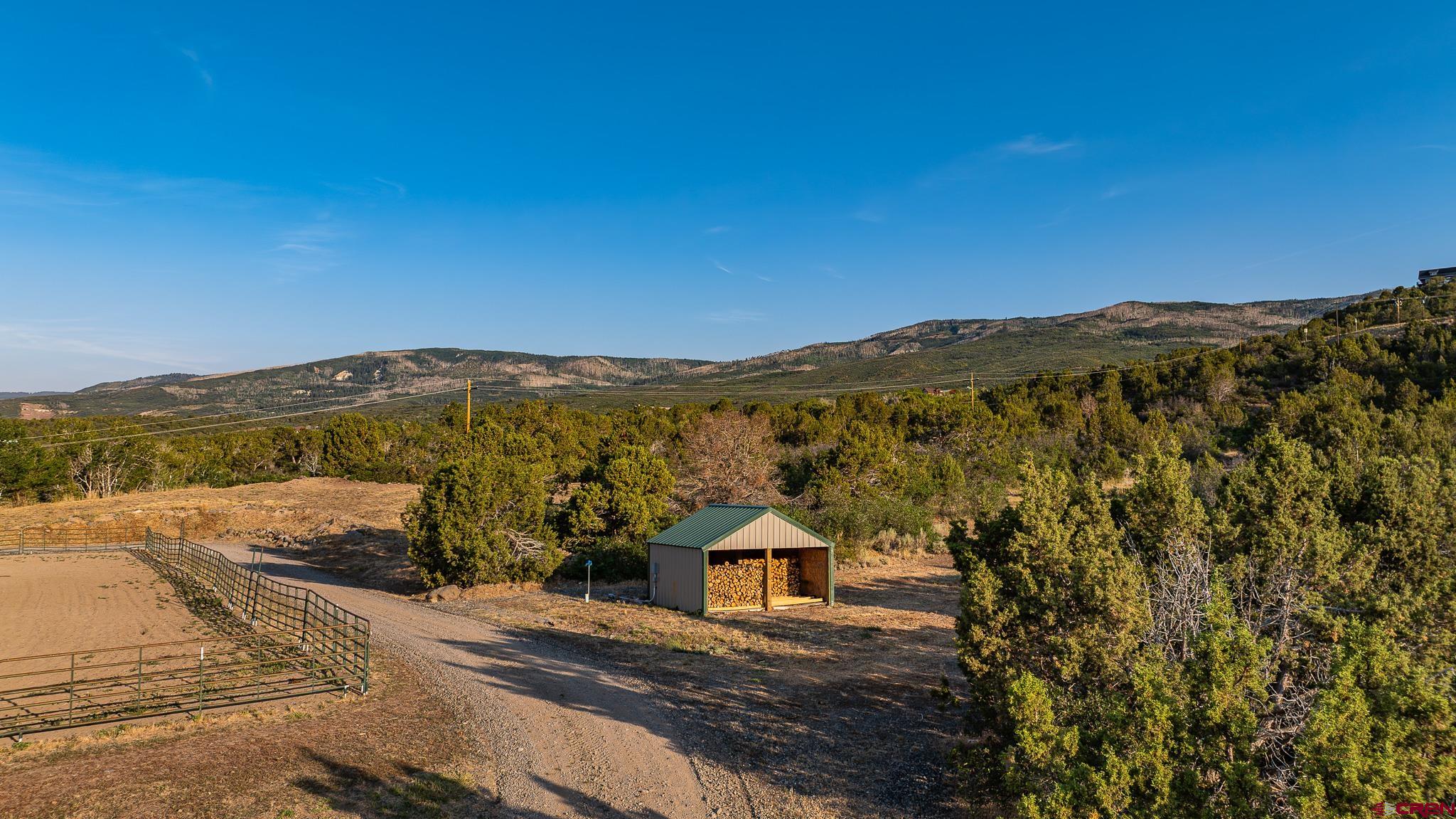 21578 Highway 65 Cedaredge, CO 81413 - Photo 7 of 45 a view of an ocean with a mountain