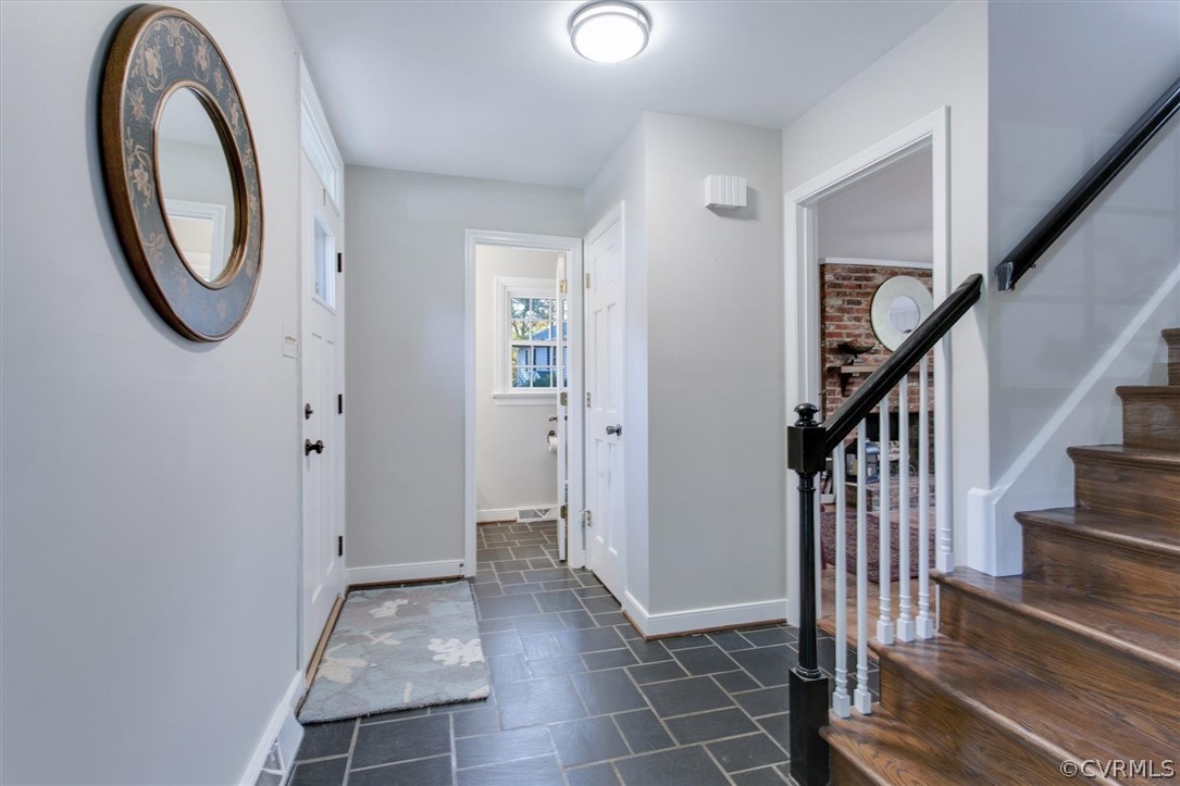 3670 Hemlock Road Chester, VA 23831 - Photo 14 of 49 a view of a hallway with wooden floor and entryway