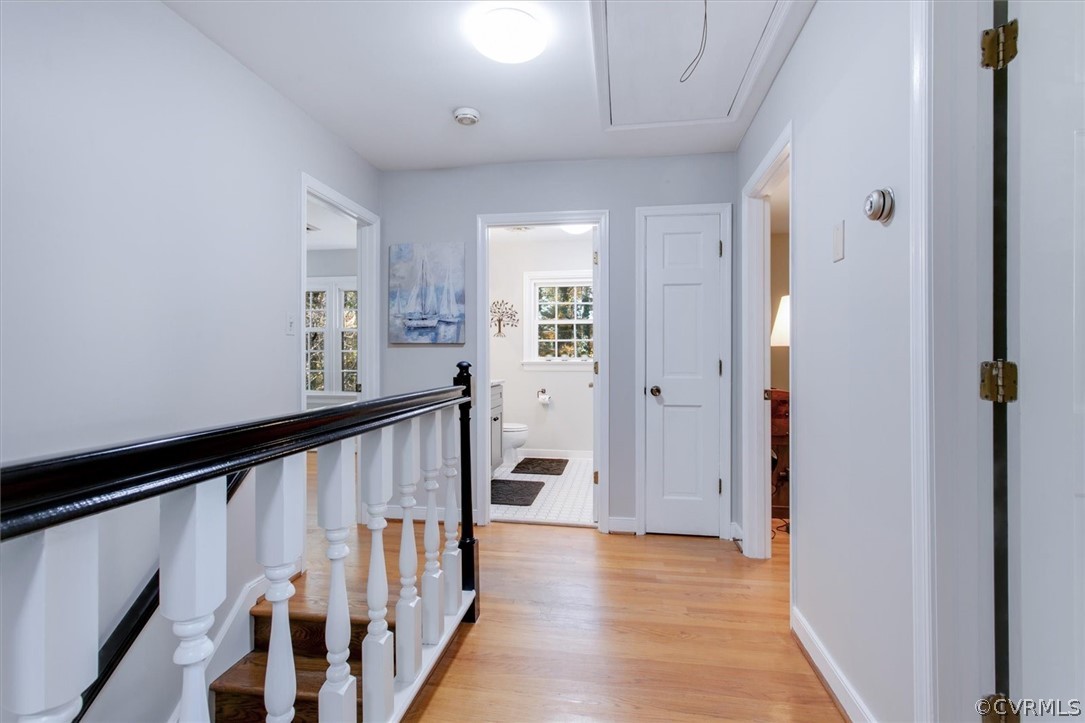 3670 Hemlock Road Chester, VA 23831 - Photo 23 of 49 a view of a hallway with wooden floor and windows