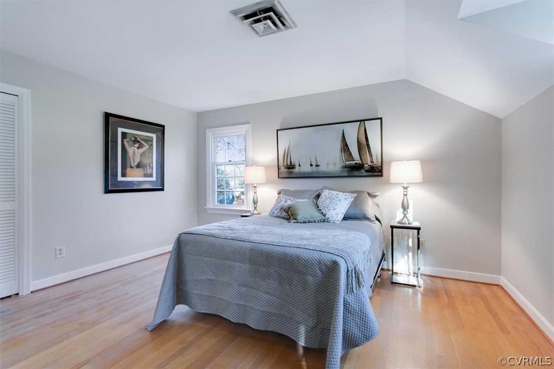 3670 Hemlock Road Chester, VA 23831 - Photo 25 of 49 a bedroom with a bed window and painting on the wall