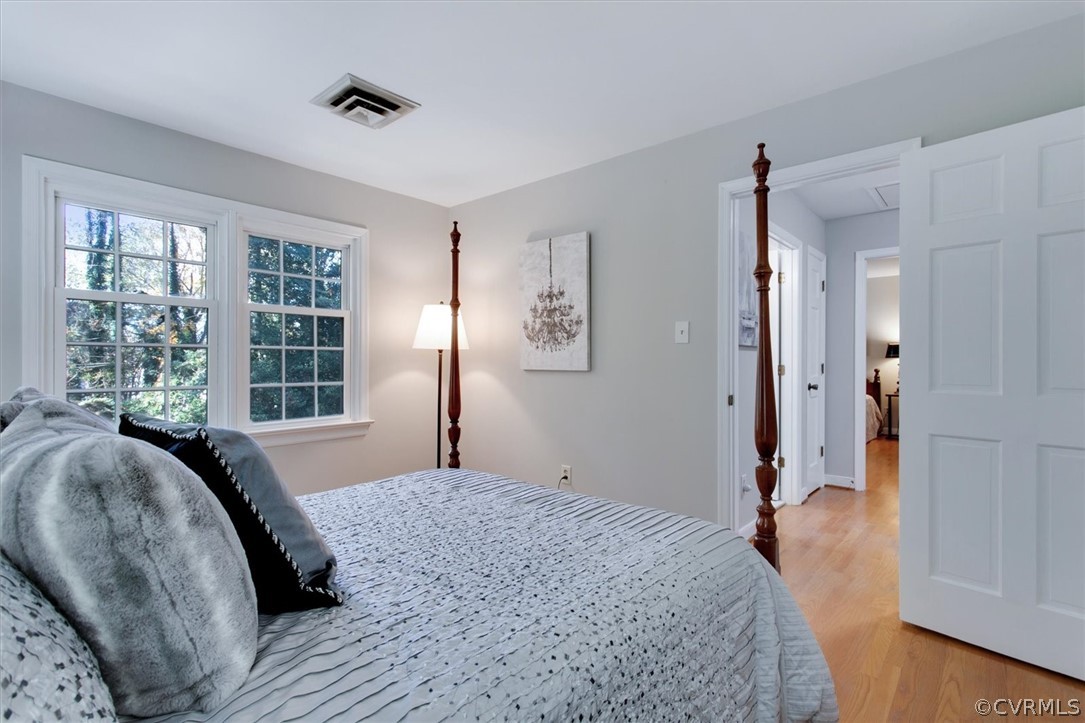 3670 Hemlock Road Chester, VA 23831 - Photo 30 of 49 a spacious bedroom with a large bed and a dresser