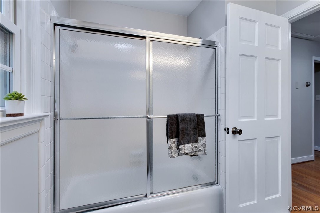 3670 Hemlock Road Chester, VA 23831 - Photo 35 of 49 a bathroom with a glass shower door