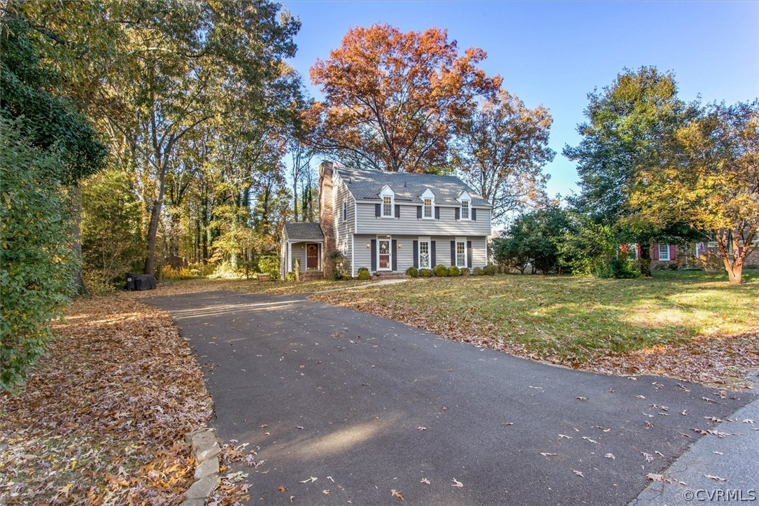 3670 Hemlock Road Chester, VA 23831 - Photo 38 of 49 a front view of a house with a yard and garage