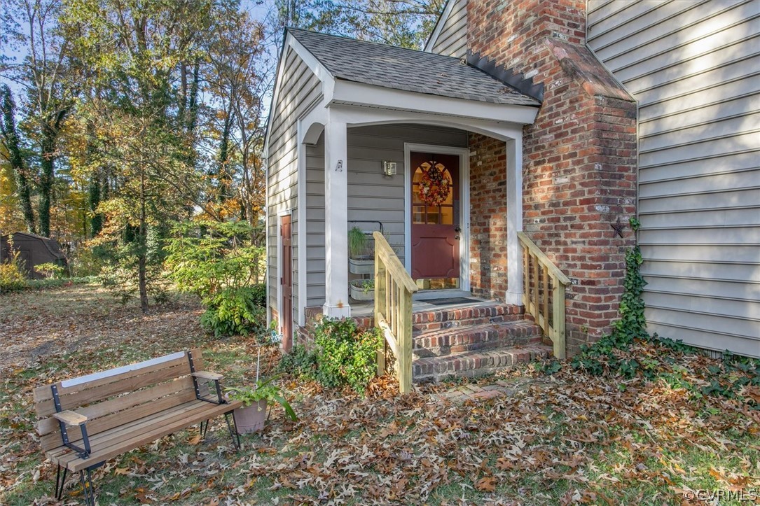 3670 Hemlock Road Chester, VA 23831 - Photo 41 of 49 a front view of a house with garden