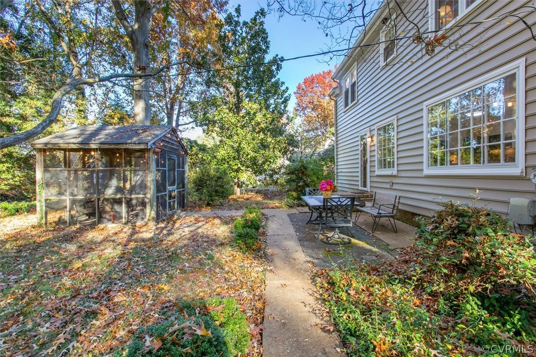 3670 Hemlock Road Chester, VA 23831 - Photo 45 of 49 a view of a house with sitting area and a garden