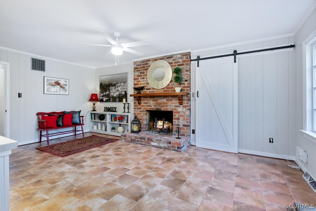 3670 Hemlock Road Chester, VA 23831 - Photo 10 of 49 a living room with furniture a flat screen tv and a fireplace