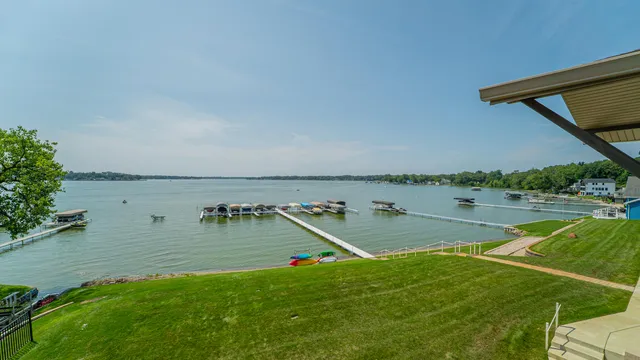 a view of a lake with a yard