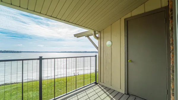 a kitchen with stainless steel appliances granite countertop a refrigerator and a stove