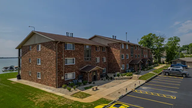 a view of a house with yard and hallway