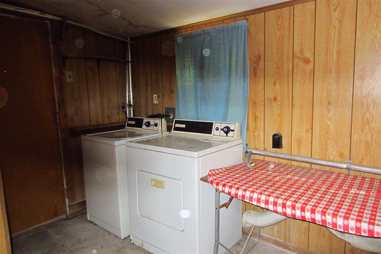 508 Pelham Road Pensacola, FL 32507 - Photo 15 of 22 W/D, Folding Table & Door to sidewalk to Carport