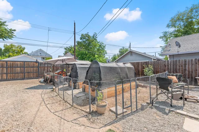 a view of outdoor space and wooden fence