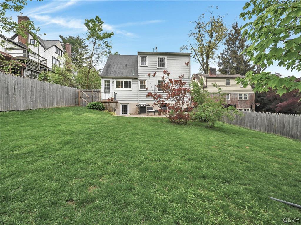 16 Hewett Road Cheltenham, PA 19095 - Photo 17 of 19 a view of a house with a yard and sitting area