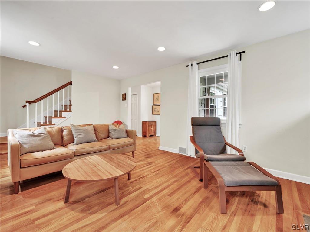 16 Hewett Road Cheltenham, PA 19095 - Photo 8 of 19 a living room with a couch and a wooden floor