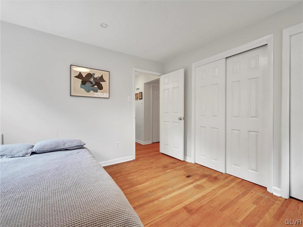 16 Hewett Road Cheltenham, PA 19095 - Photo 10 of 19 a bedroom with a bed and a painting on the wall