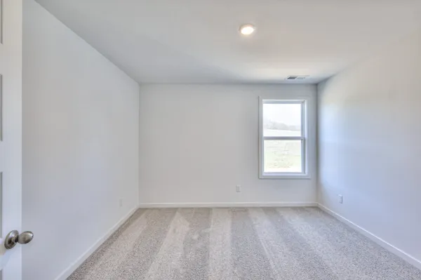 an empty room with closet
