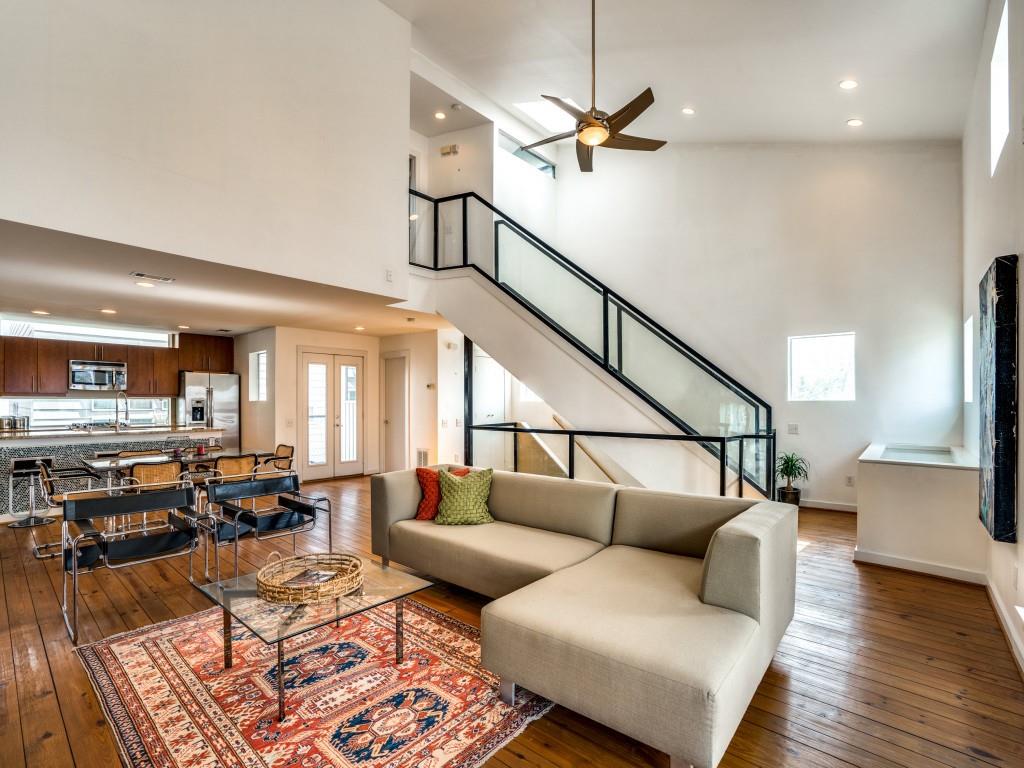 4605 Lester Drive Dallas, TX 75219 - Photo 1 of 1 a living room with furniture and wooden floor