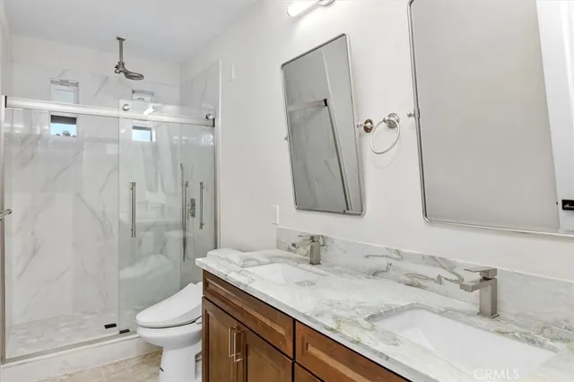 a view of an empty room with glass door