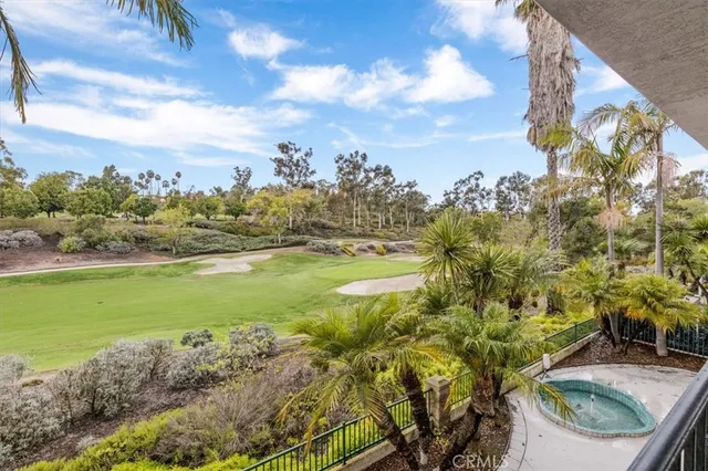 a bathroom with a shower sink and mirror