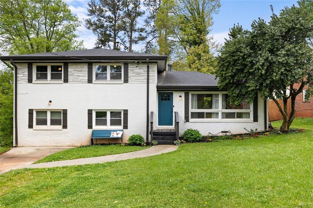 2949 Toney Drive Decatur, GA 30032 - Photo 1 of 1 a front view of a house with a yard