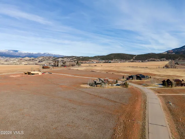 a view of an ocean and city