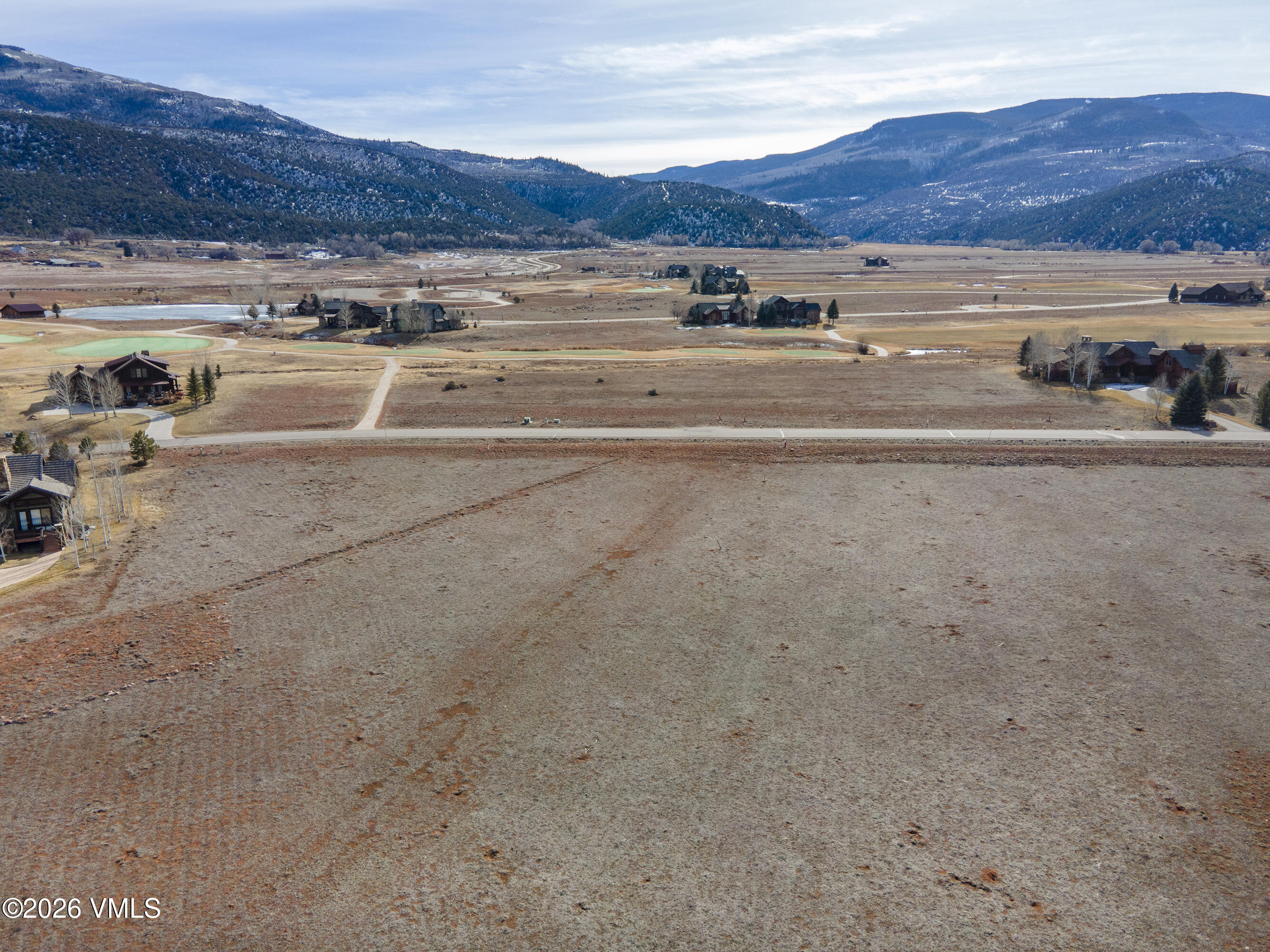 196 Foxprowl Gypsum, CO 81637 - Photo 5 of 11 a view of a house with a yard and a large tree