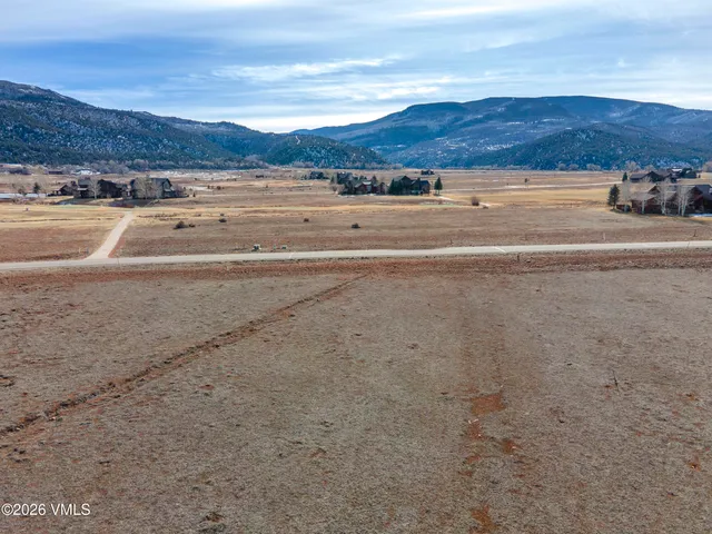a view of ocean and mountain