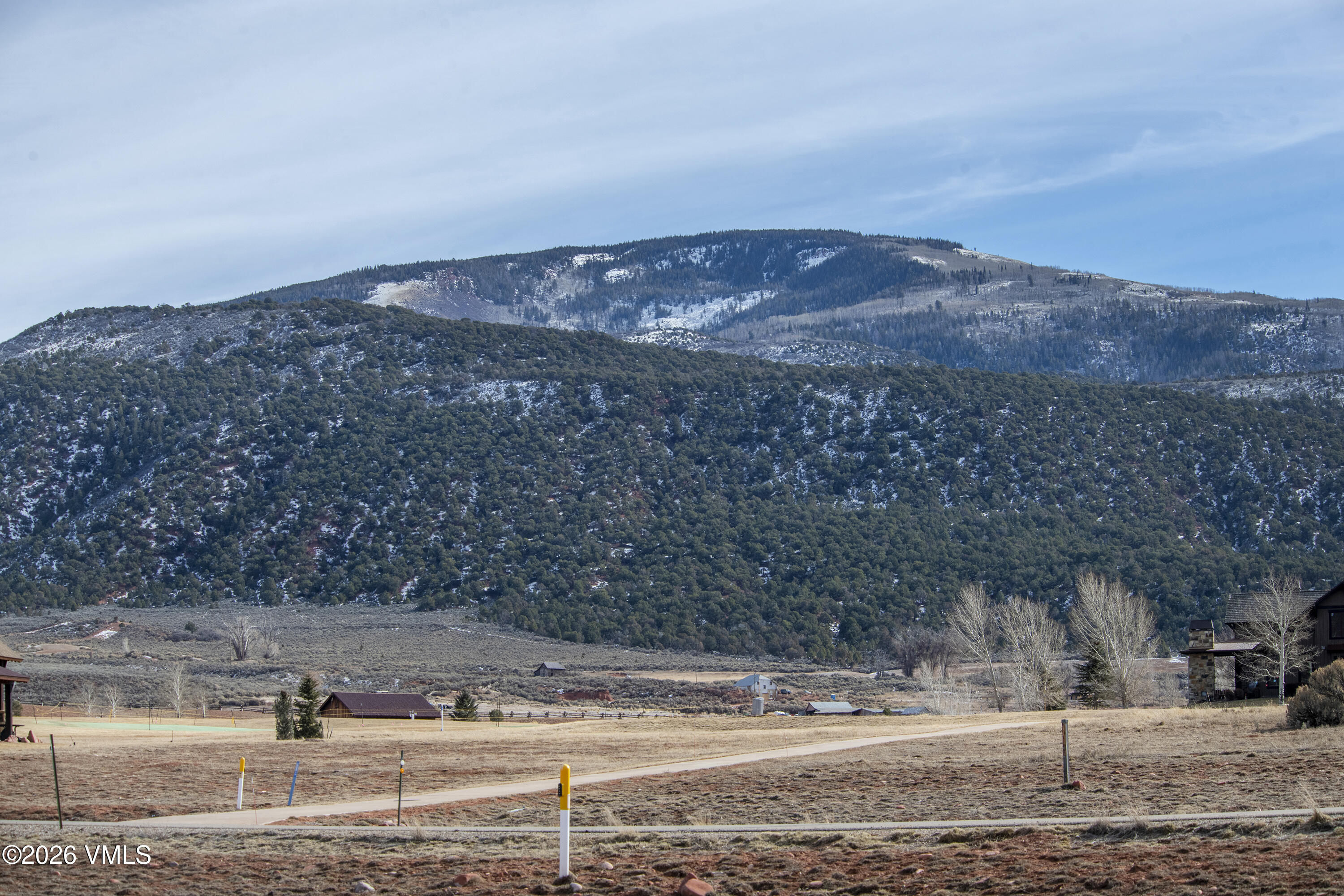 196 Foxprowl Gypsum, CO 81637 - Photo 9 of 11 a view of a dry yard with mountain