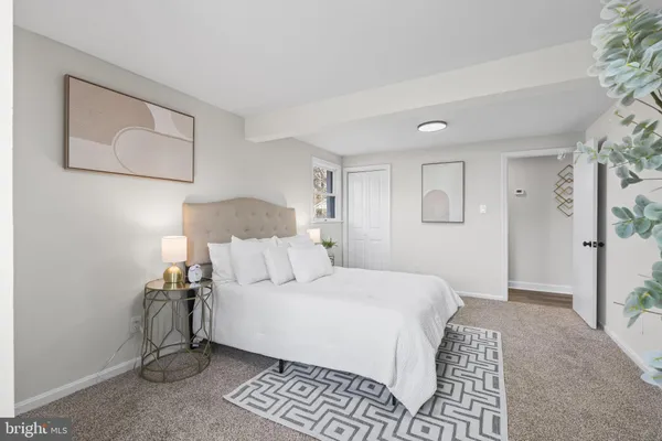 a view of an empty room with windows